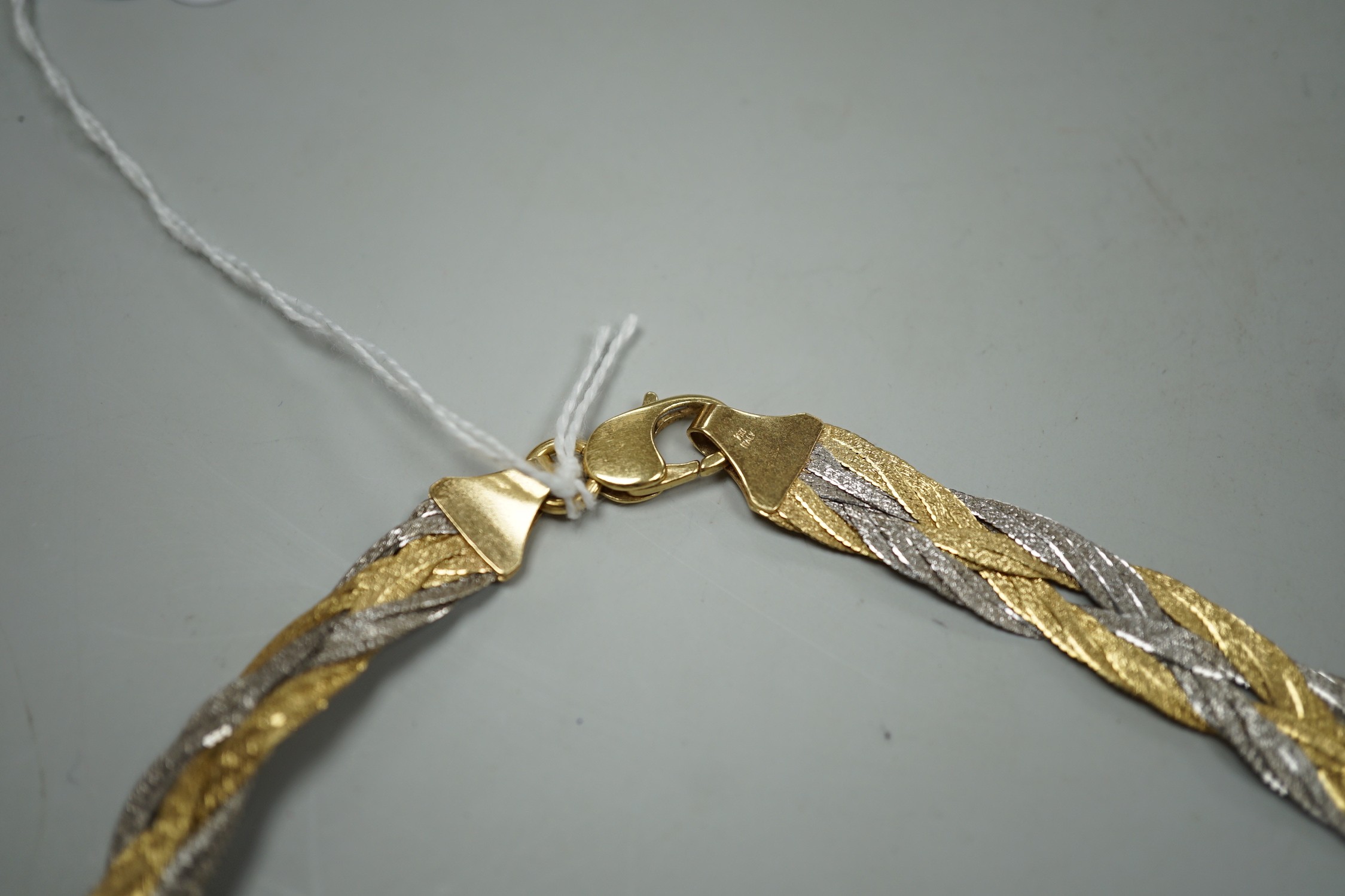 A modern Italian two colour 750 interwoven necklace, 38cm, 33.8 grams.